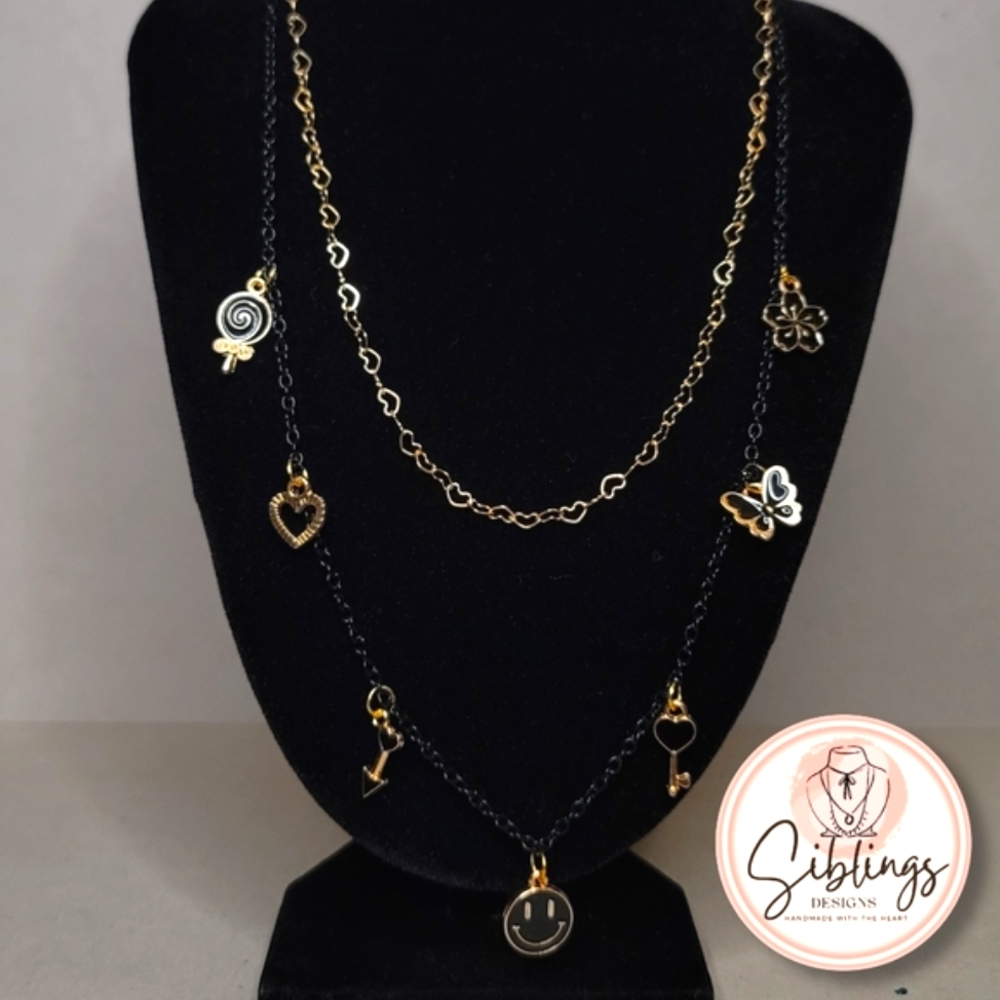 Necklace with black and golden charms